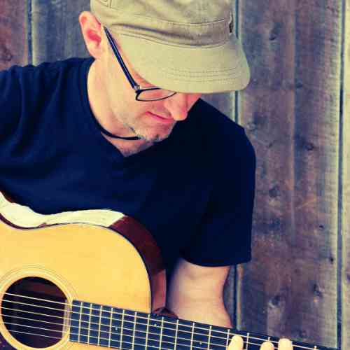 Andy Webster playing guitar